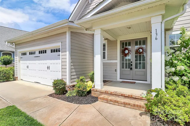 a view of a entryway door front of house