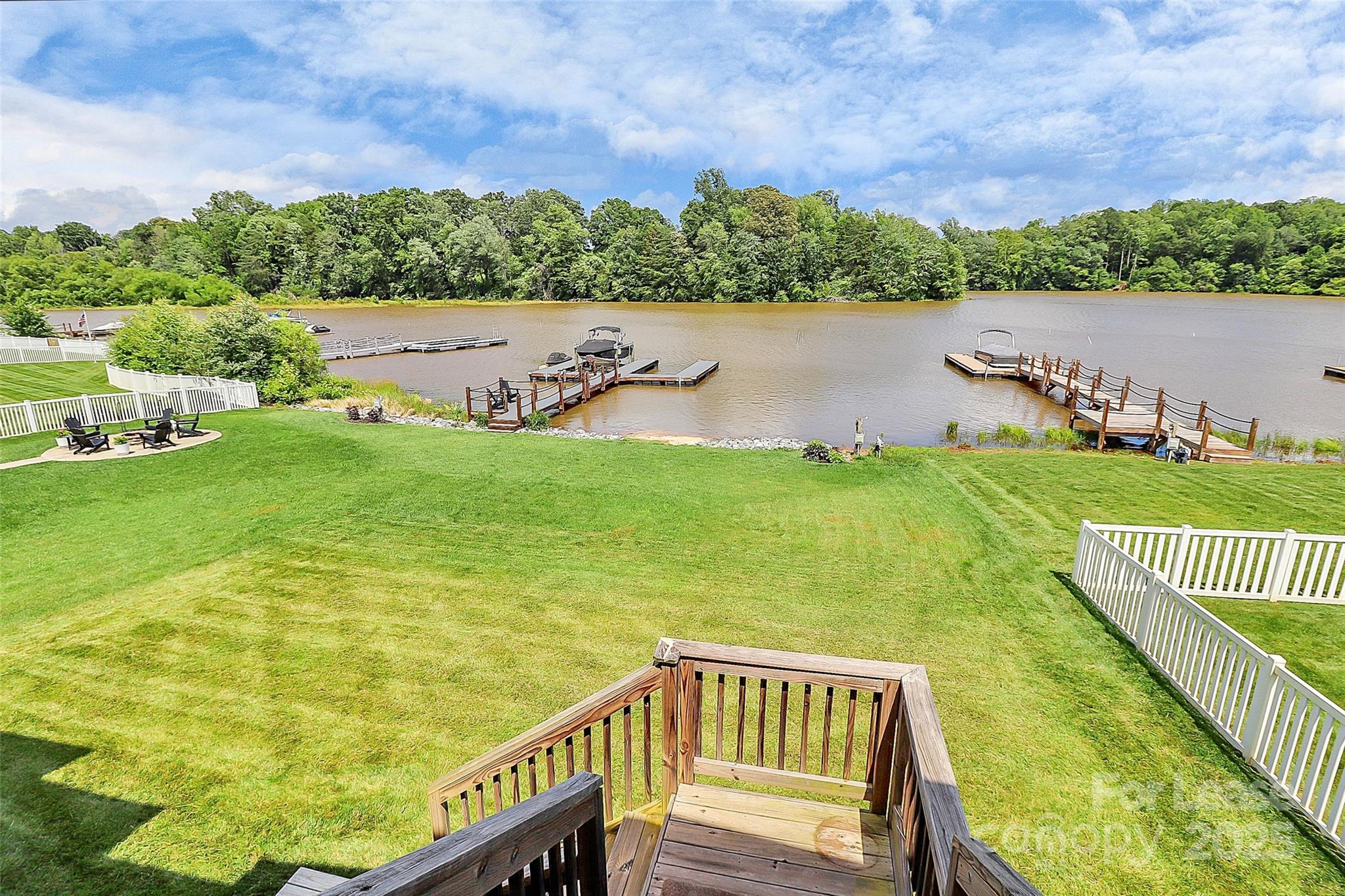 136 Preston Road Mooresville, NC 28117 - Photo 35 of 46 a view of a garden and lake view