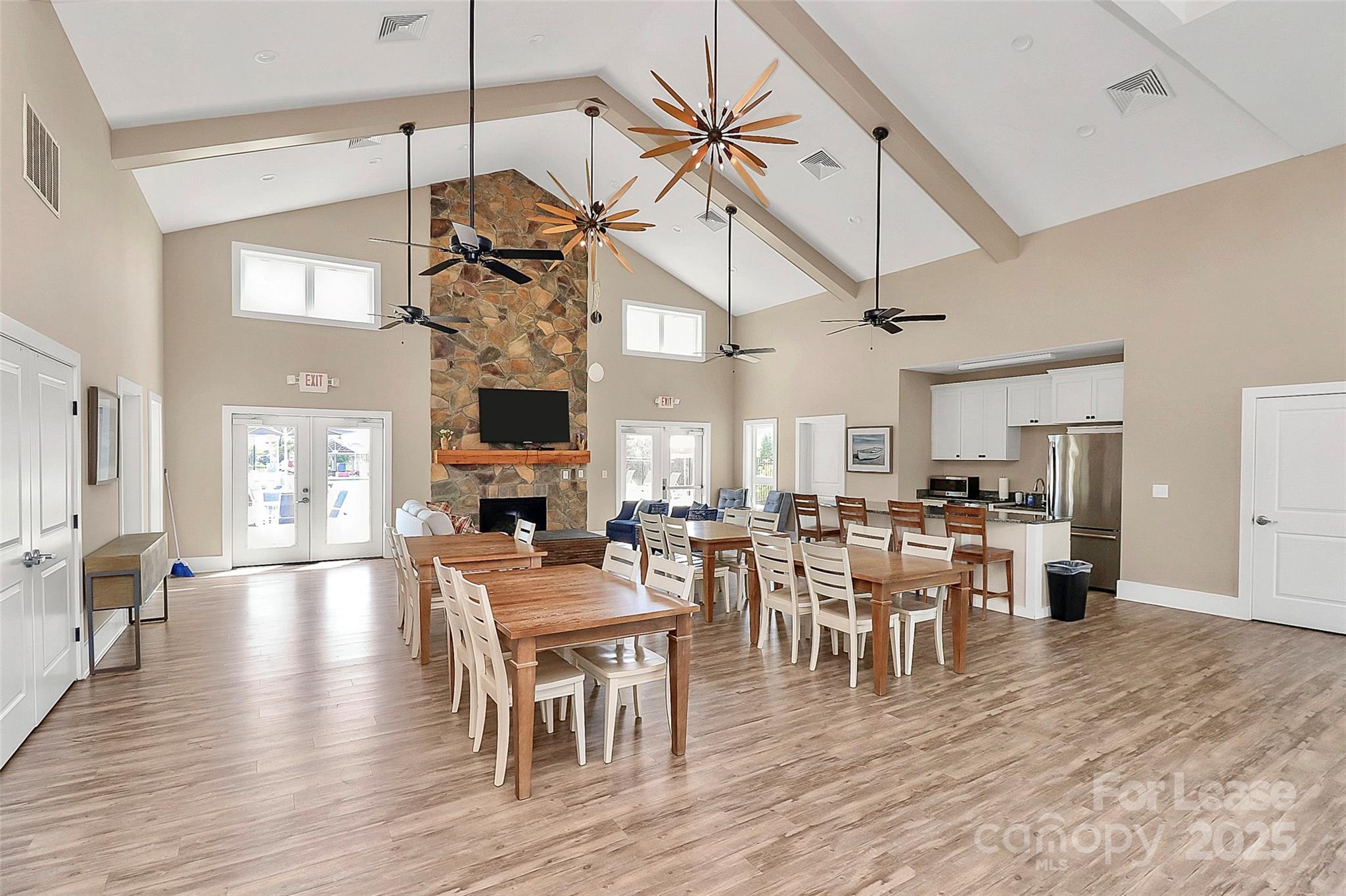 136 Preston Road Mooresville, NC 28117 - Photo 44 of 46 a view of a dining room and livingroom with furniture wooden floor a chandelier
