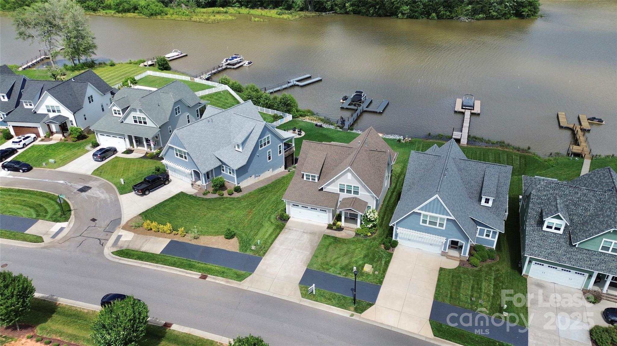 136 Preston Road Mooresville, NC 28117 - Photo 46 of 46 an aerial view of houses with yard
