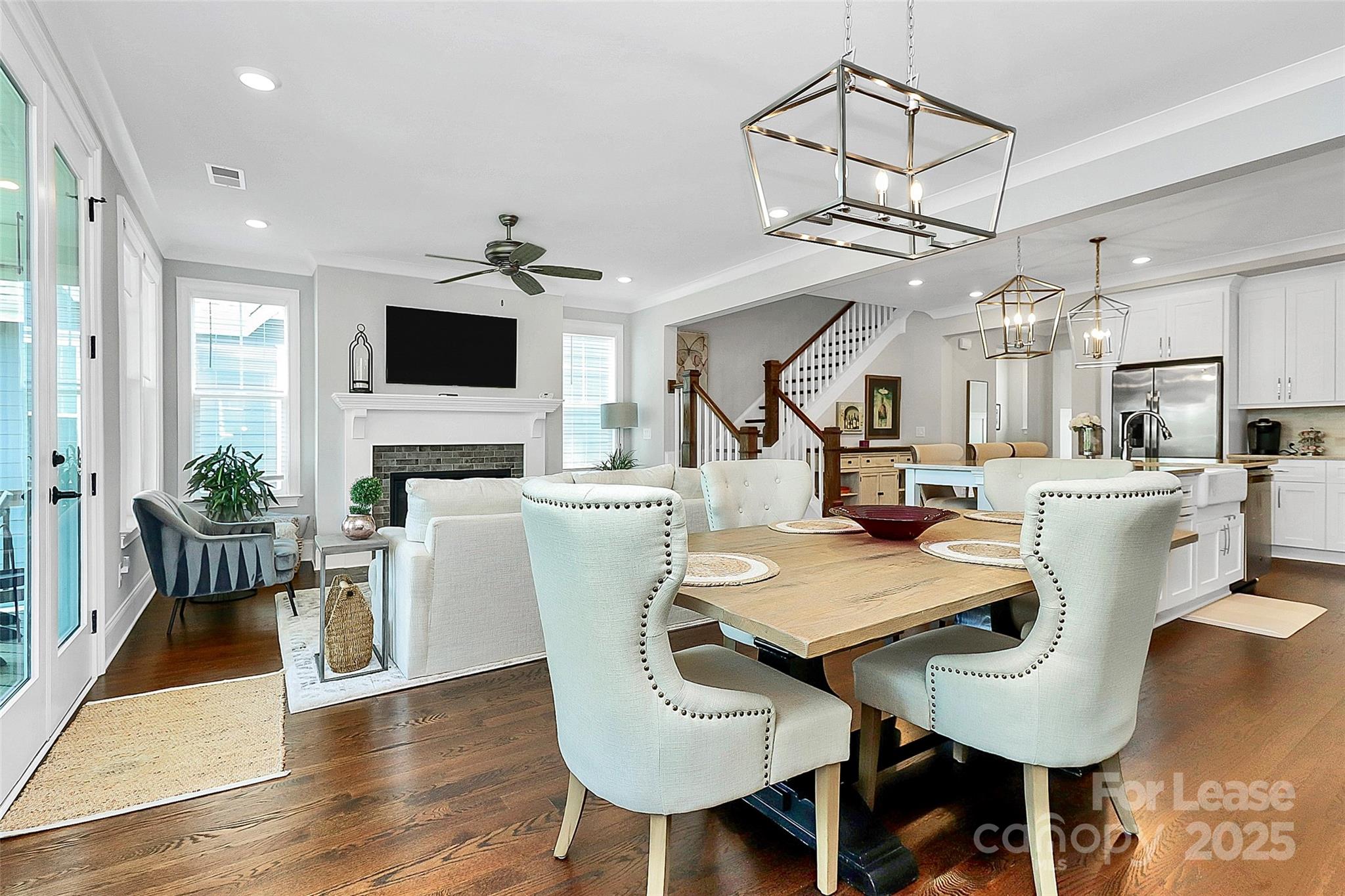 136 Preston Road Mooresville, NC 28117 - Photo 7 of 46 a view of a dining room with furniture and wooden floor