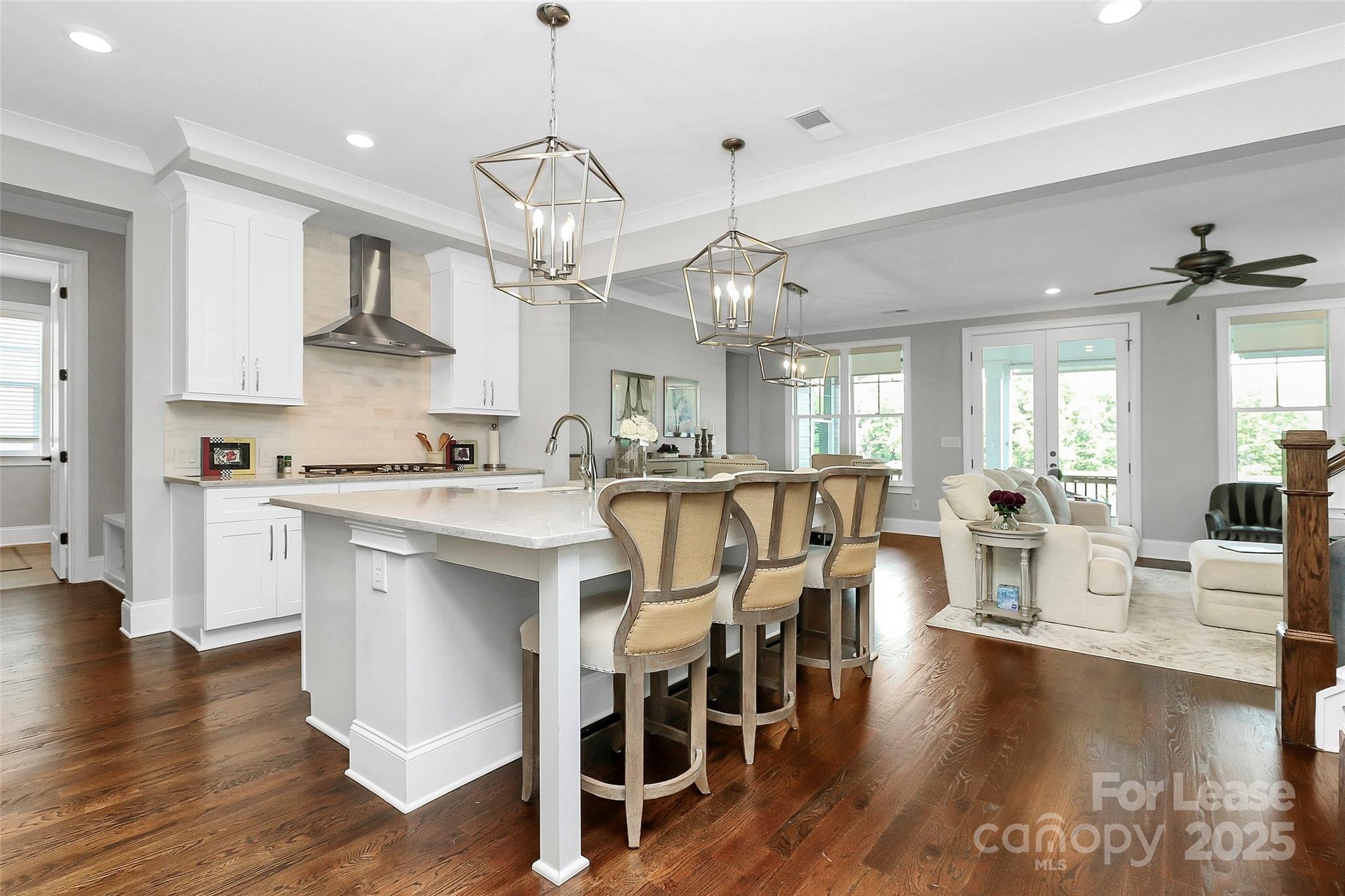 136 Preston Road Mooresville, NC 28117 - Photo 9 of 46 a large kitchen with a table and chairs