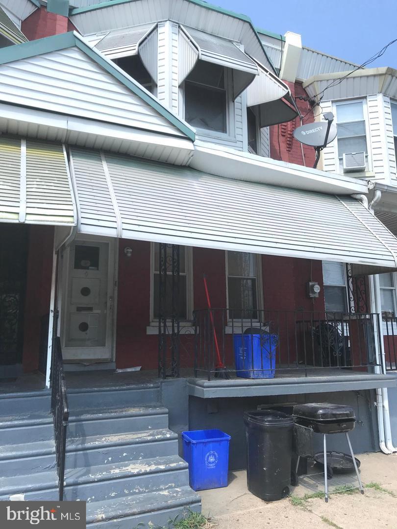 a front view of house with outdoor space