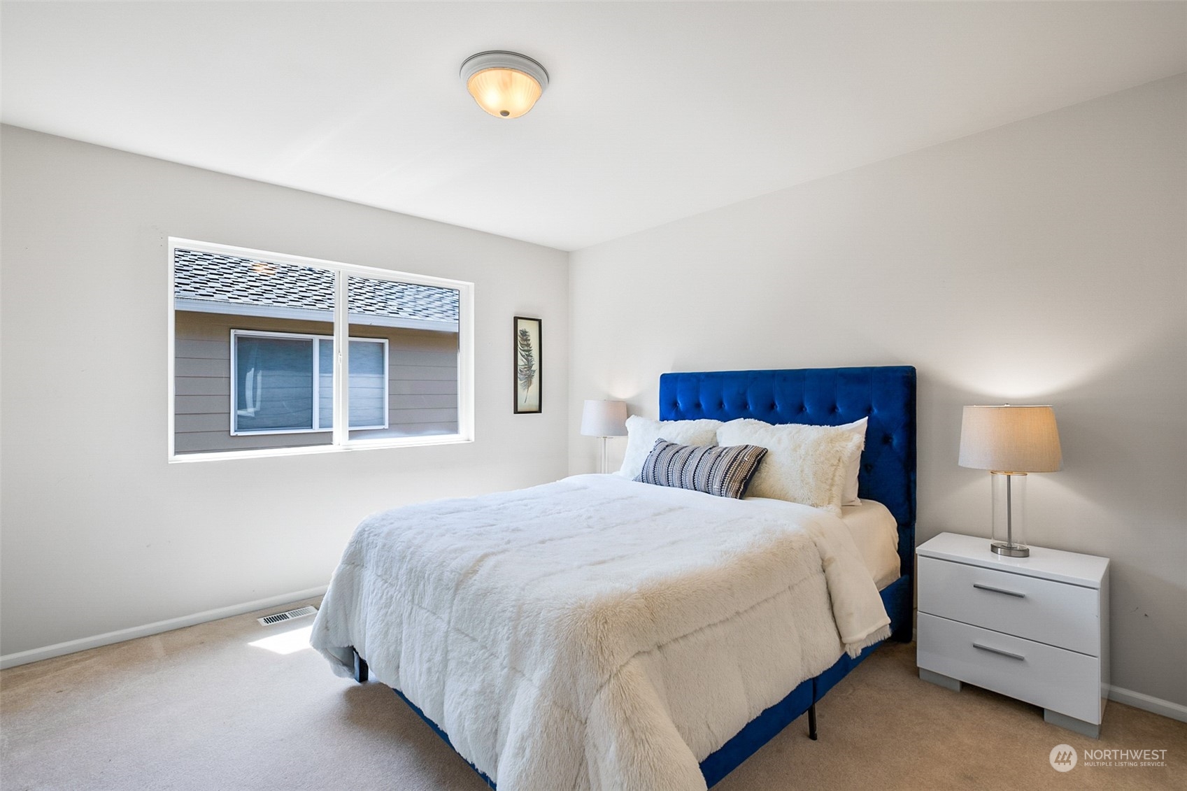 17405 33rd Drive Southeast Bothell, WA 98012 - Photo 28 of 38 a bedroom with a bed and a dresser