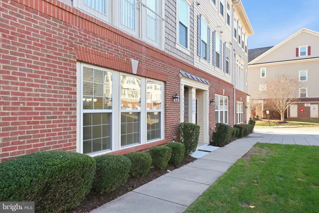 a view of a building with a yard