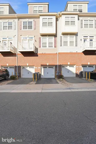 a view of a car parked in front of a building
