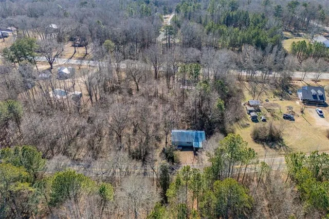 an aerial view of residential house with outdoor space