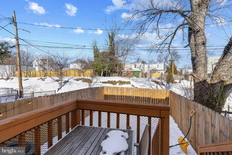 a view of a balcony with furniture