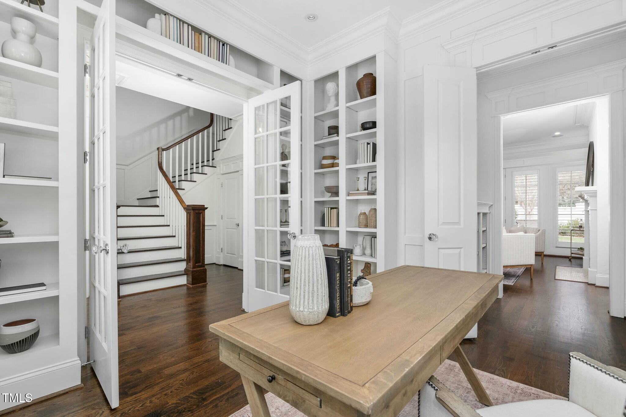 543 Guilford Circle Raleigh, NC 27608 - Photo 27 of 62 a view of a dining room with furniture and wooden floor