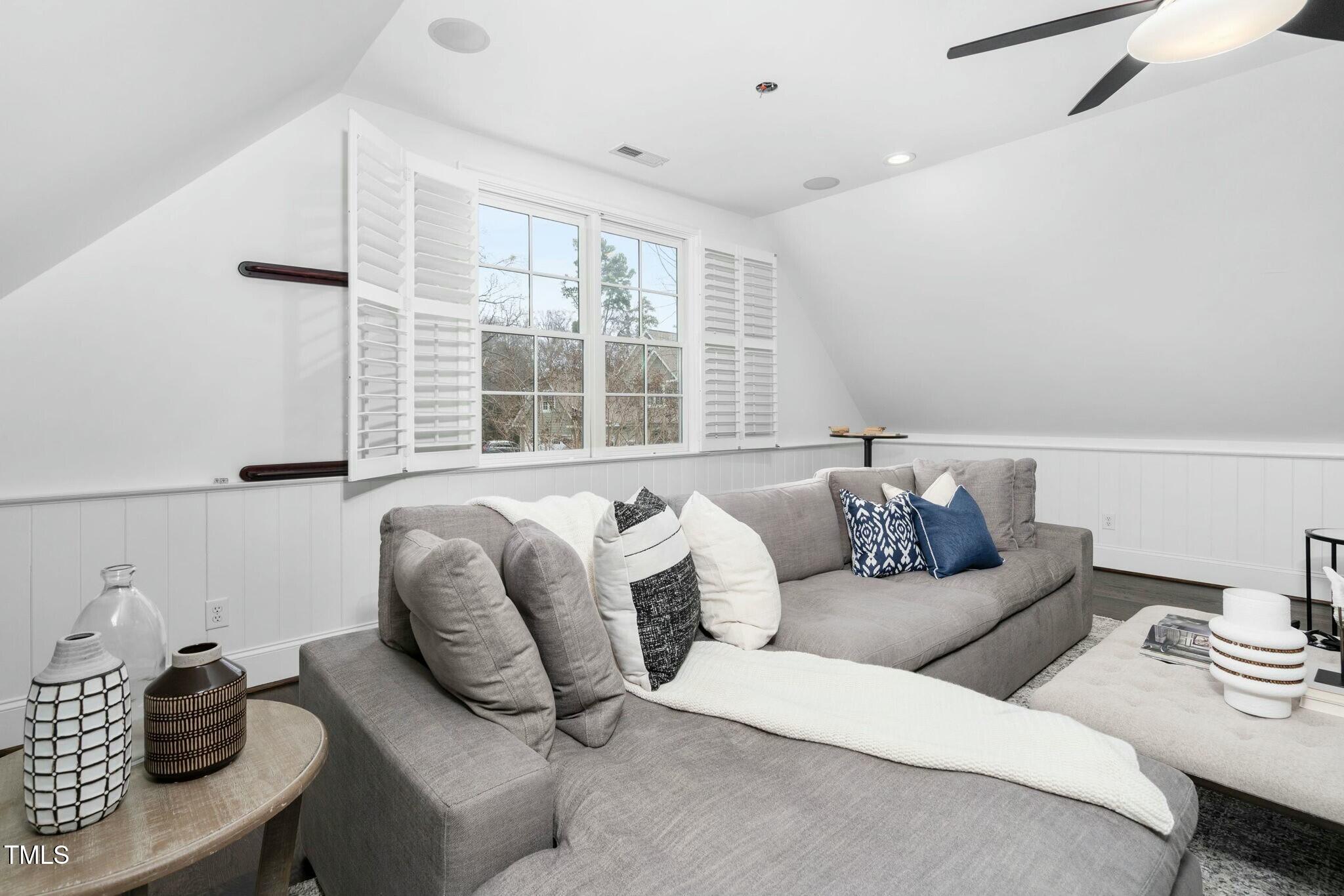 543 Guilford Circle Raleigh, NC 27608 - Photo 33 of 62 a living room with furniture and a large window