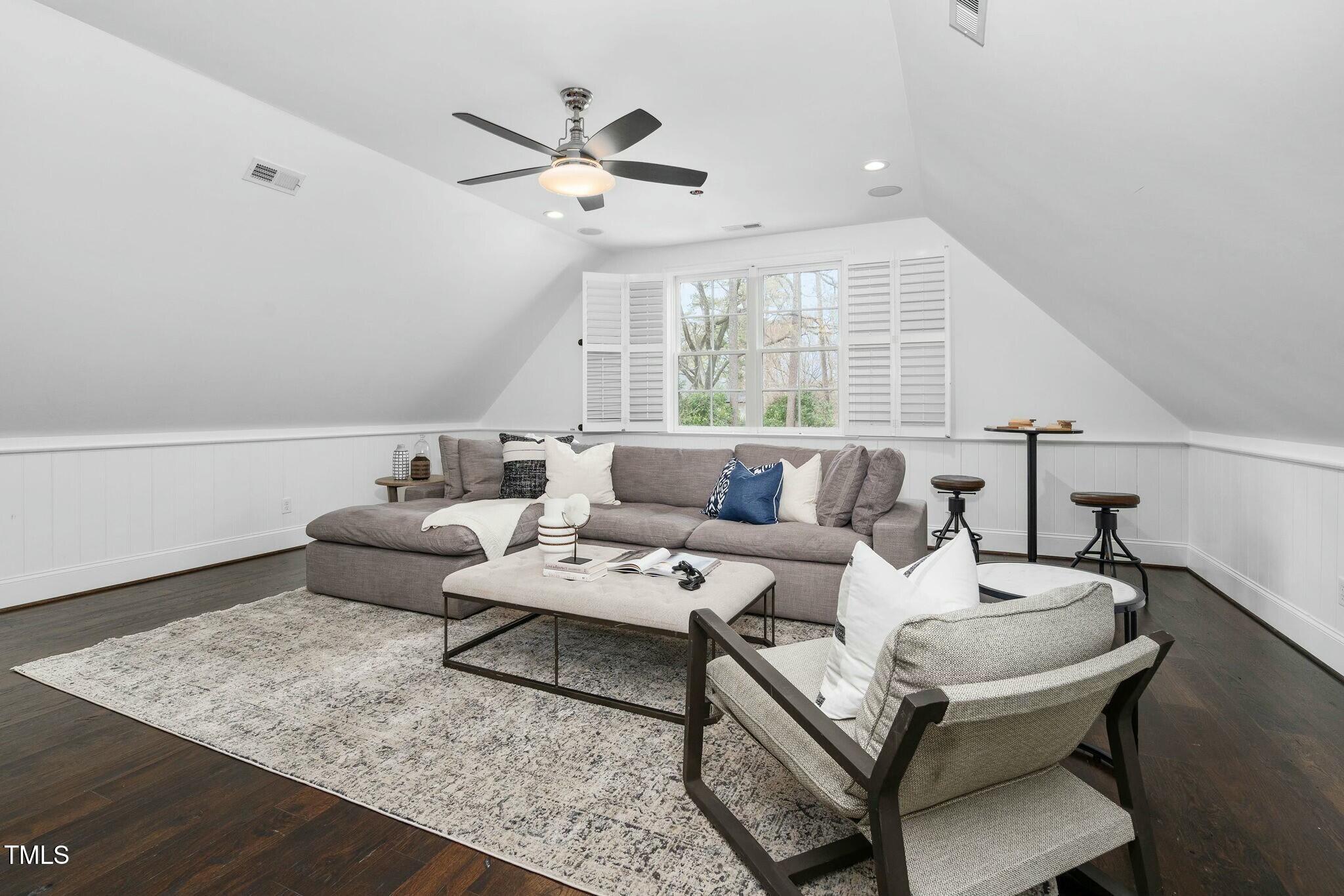 543 Guilford Circle Raleigh, NC 27608 - Photo 34 of 62 a living room with furniture and a large window