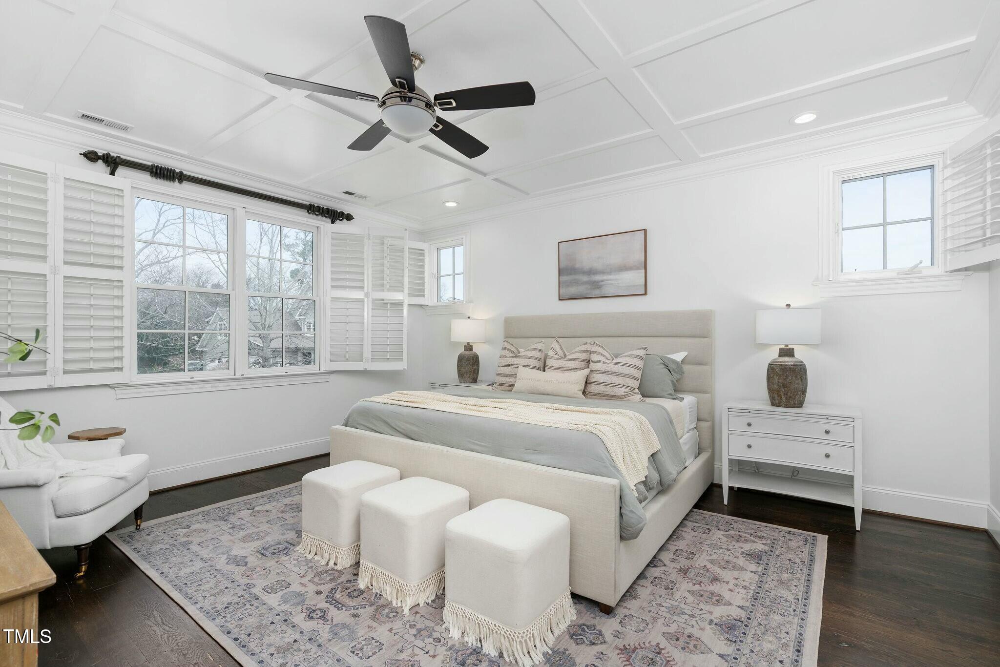 543 Guilford Circle Raleigh, NC 27608 - Photo 37 of 62 a spacious bedroom with a bed and a window