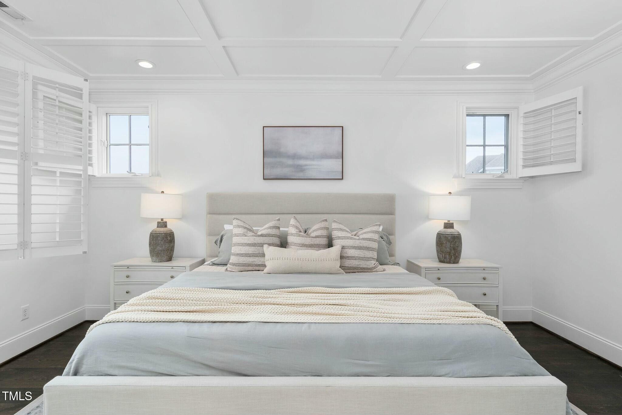 543 Guilford Circle Raleigh, NC 27608 - Photo 39 of 62 a bedroom with a bed and a window