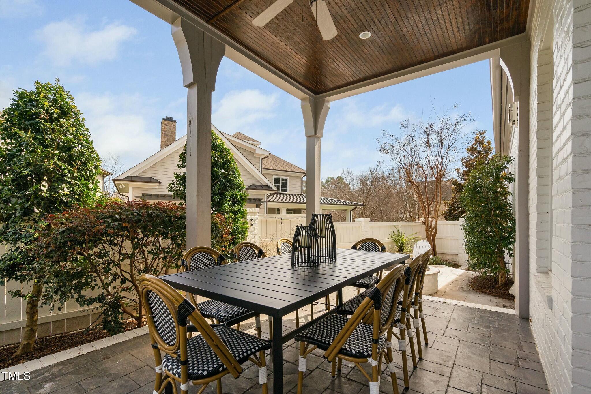 543 Guilford Circle Raleigh, NC 27608 - Photo 54 of 62 a view of an outside dining space with furniture