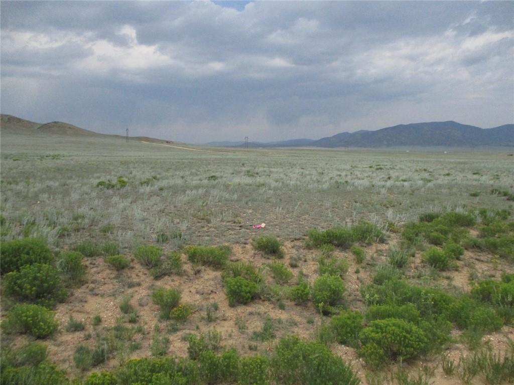 4995 Rio Blanco Road Hartsel, CO 80449 - Photo 1 of 17 a view of a field and mountains