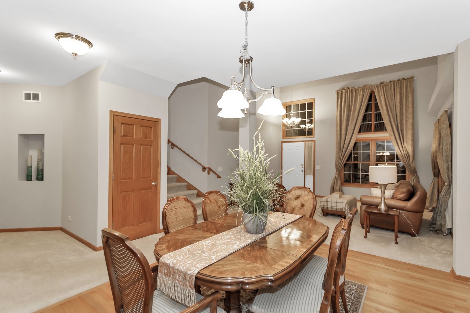 518 Ridge Drive Elburn, IL 60119 - Photo 8 of 27 a view of a dining room with furniture and wooden floor