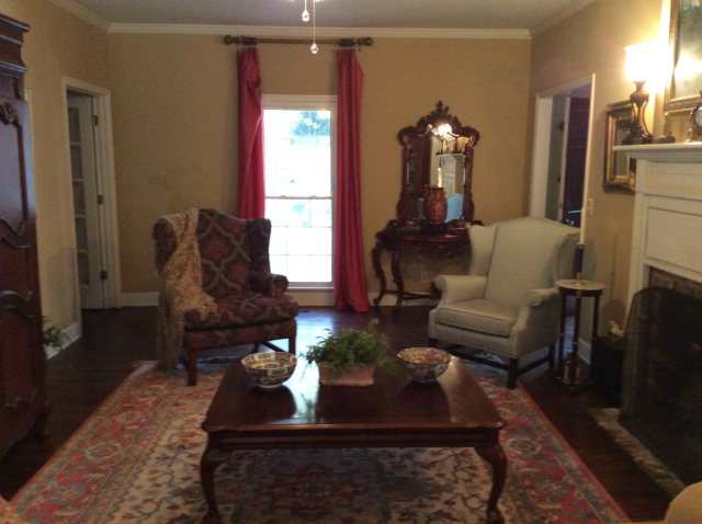 6370 New Forsyth Road Macon, GA 31210 - Photo 3 of 32 a living room with furniture and a chandelier