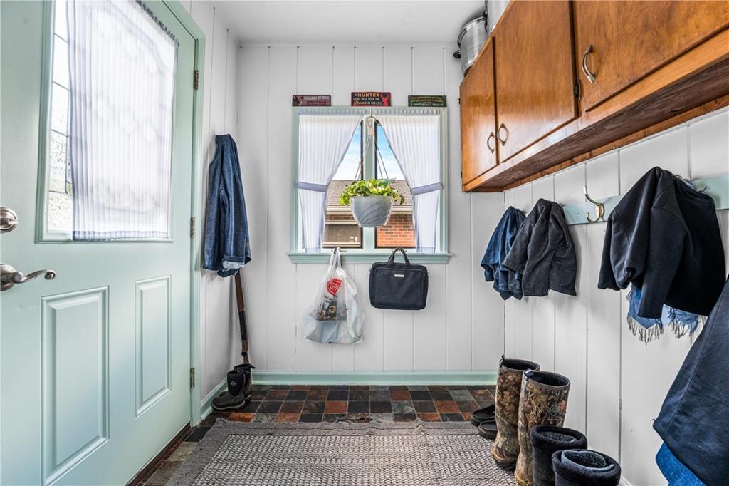 332 Pulaski Road Pulaski, PA 16143 - Photo 13 of 33 a view of walk in closet with clothes and shoes