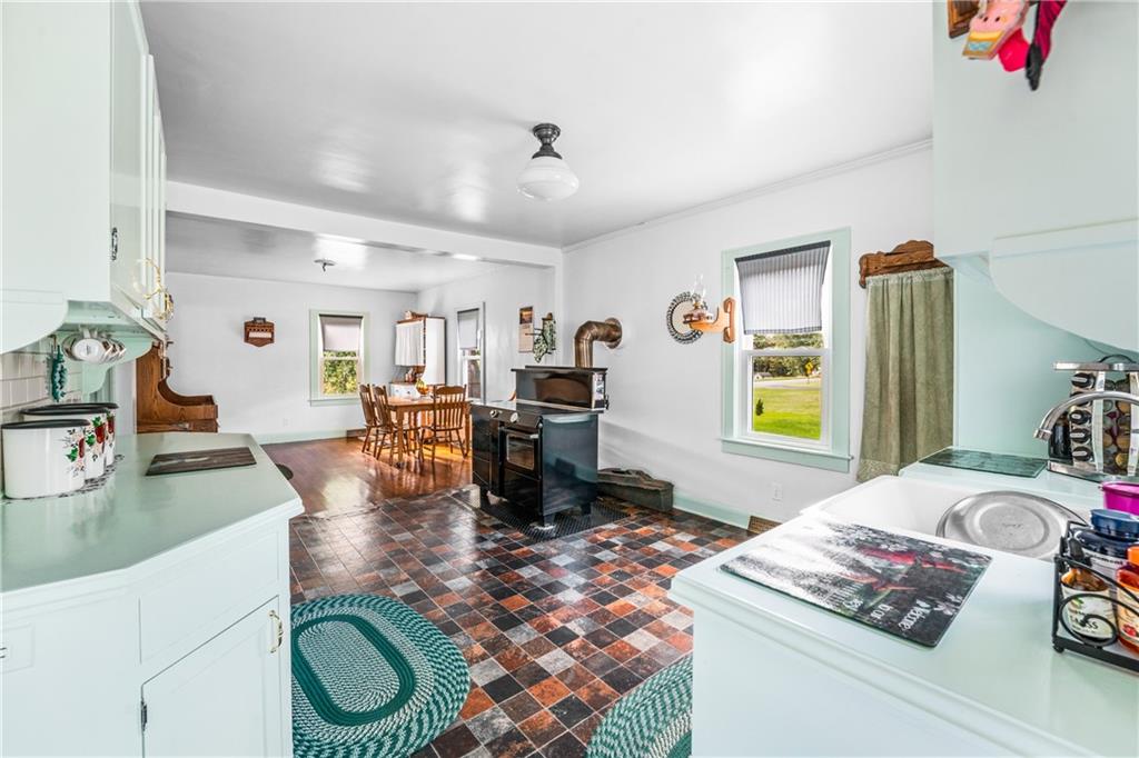 332 Pulaski Road Pulaski, PA 16143 - Photo 14 of 33 a living room with hard wood flooring and furniture