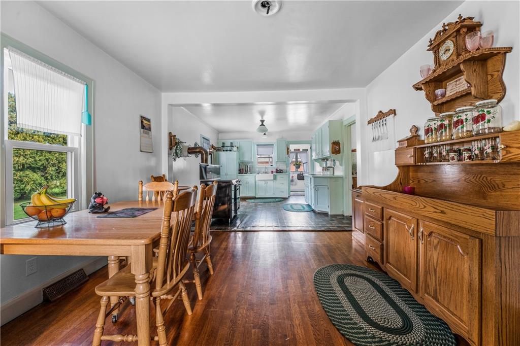 332 Pulaski Road Pulaski, PA 16143 - Photo 18 of 33 a kitchen with furniture a counter space and stainless steel appliances