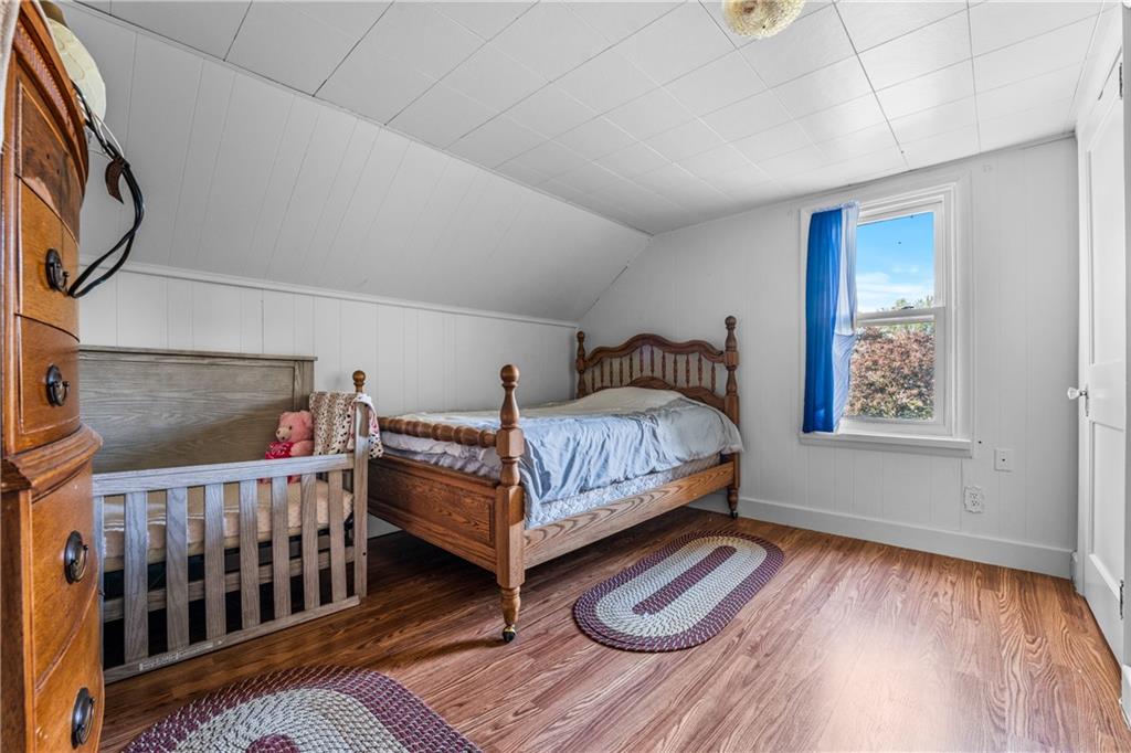 332 Pulaski Road Pulaski, PA 16143 - Photo 29 of 33 a bedroom with furniture and a window