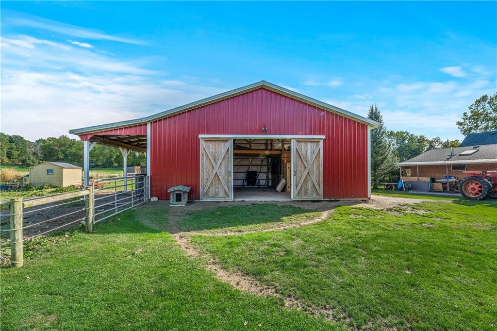 332 Pulaski Road Pulaski, PA 16143 - Photo 8 of 33 a view of a house with a yard