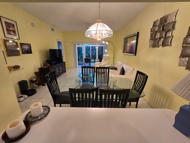 a kitchen with cabinets and steel stainless steel appliances