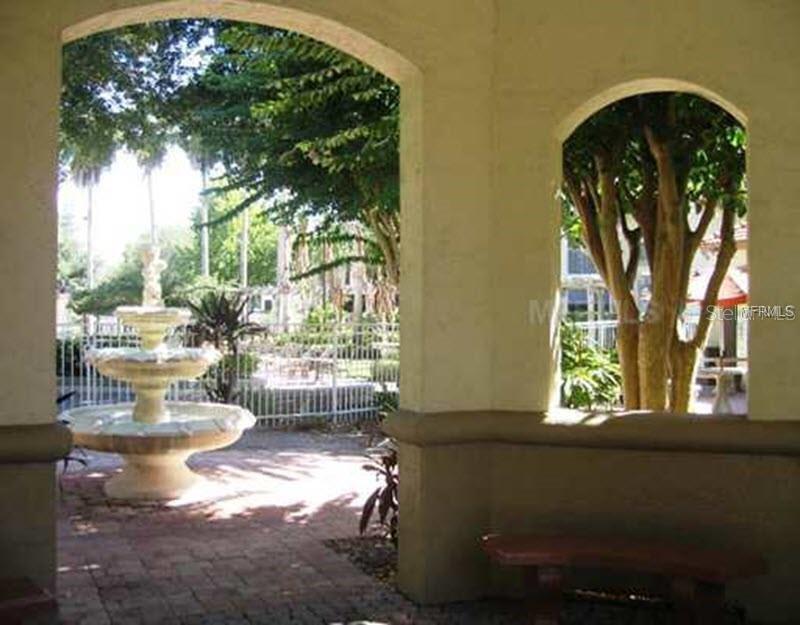 831 Camargo Way, Unit 311 Altamonte Springs, FL 32714 - Photo 18 of 28 a living room filled with furniture and a large window