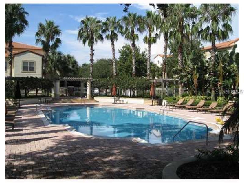 831 Camargo Way, Unit 311 Altamonte Springs, FL 32714 - Photo 19 of 28 a view of a swimming pool with a patio