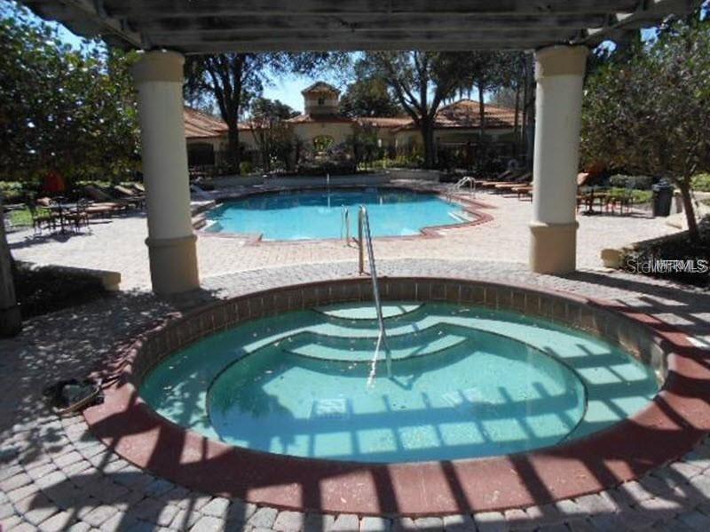 831 Camargo Way, Unit 311 Altamonte Springs, FL 32714 - Photo 21 of 28 a view of a swimming pool with a patio