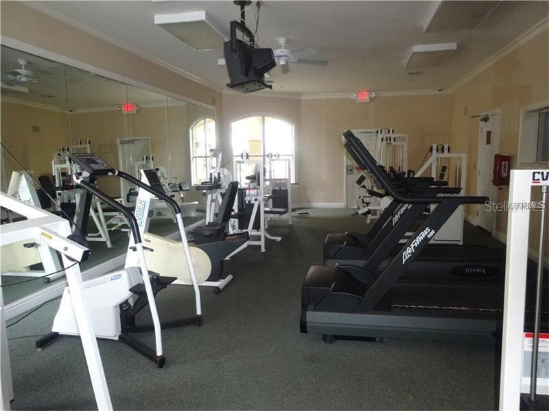 831 Camargo Way, Unit 311 Altamonte Springs, FL 32714 - Photo 22 of 28 a view of a room with gym equipment
