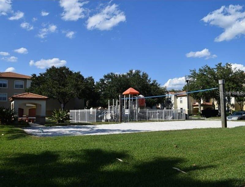 831 Camargo Way, Unit 311 Altamonte Springs, FL 32714 - Photo 23 of 28 a front view of a house with garden and sitting area