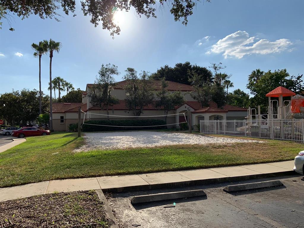 831 Camargo Way, Unit 311 Altamonte Springs, FL 32714 - Photo 25 of 28 a view of a backyard with a garden