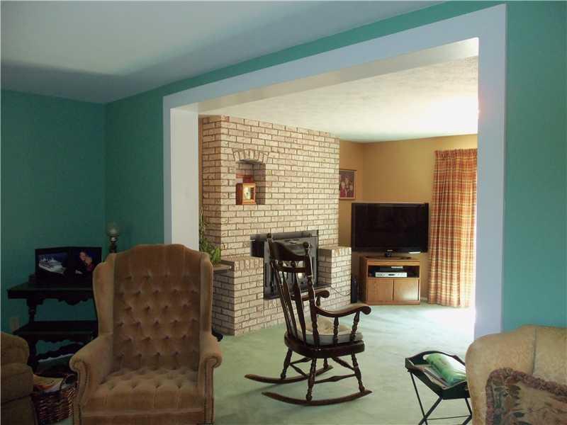 2293 Cramden Road Upper St. Clair, PA 15241 - Photo 5 of 24 Family Room. Over-sized doorway leading into family room. Brick fireplace has insert.