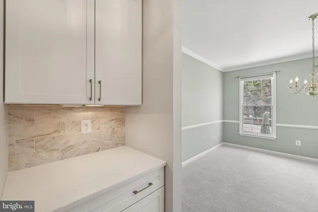 a utility room with washer and dryer