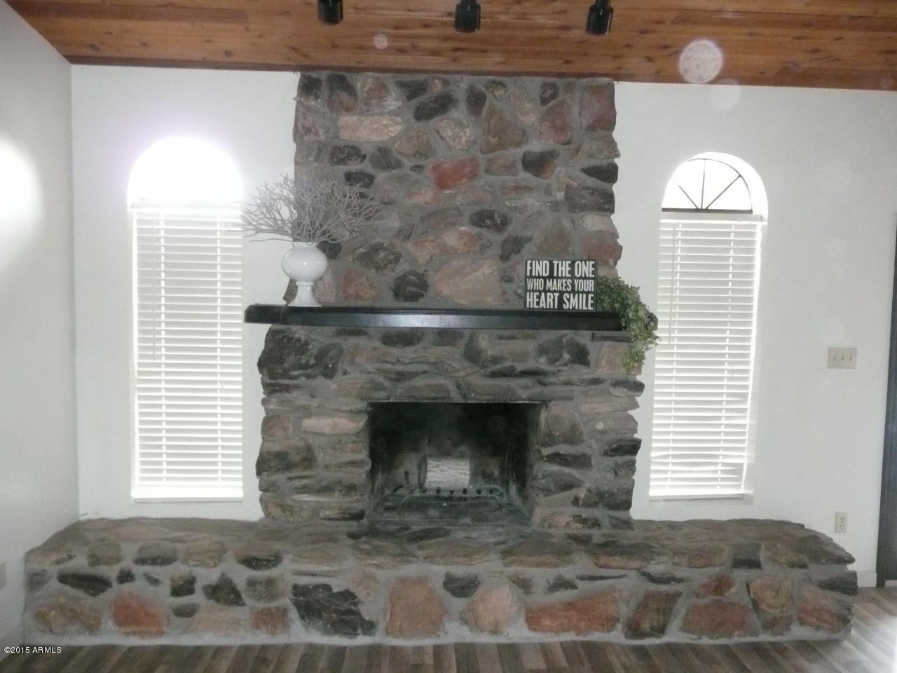 6356 West Vineyard Road Laveen, AZ 85339 - Photo 17 of 48 Unique river rock fireplace