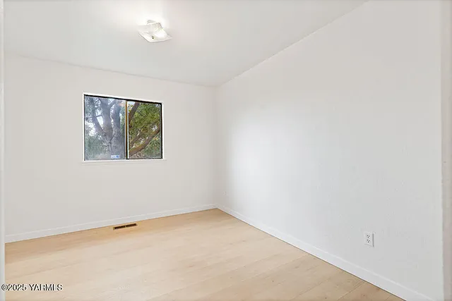 an empty room with a window