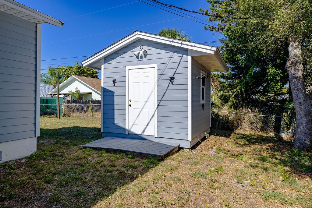 344 13th Place Southwest Vero Beach, FL 32962 - Photo 22 of 30 a front view of a house with a yard