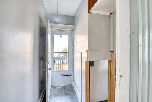 a view of a bathroom with a glass door