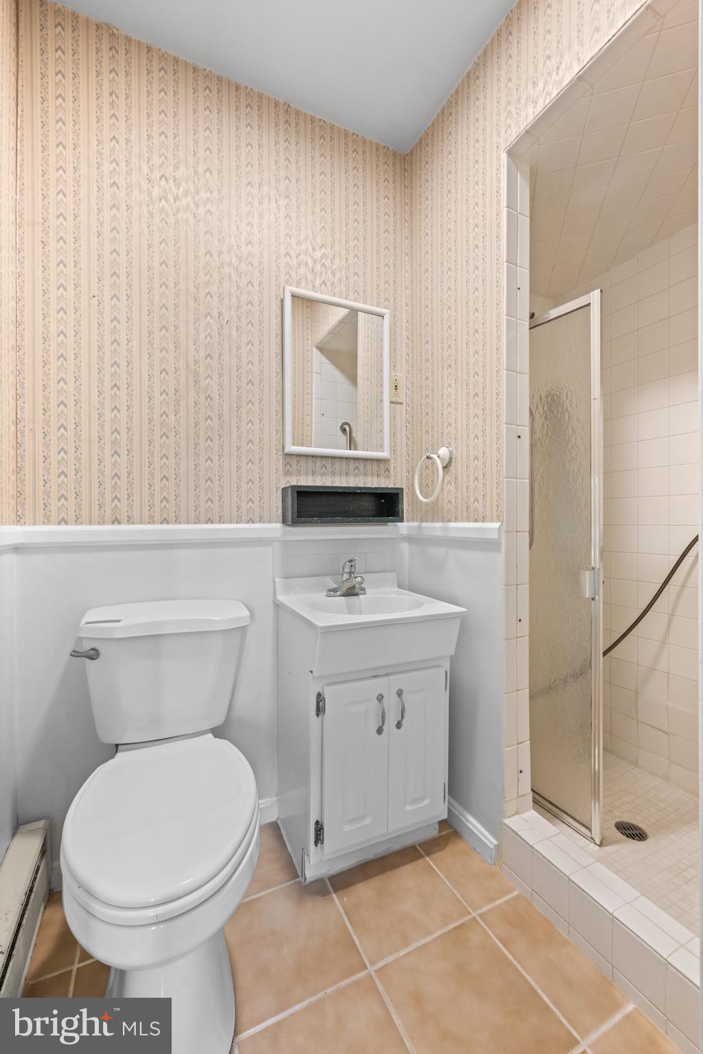 258 Monacy Road Coatesville, PA 19320 - Photo 30 of 54 a bathroom with a sink a toilet and shower