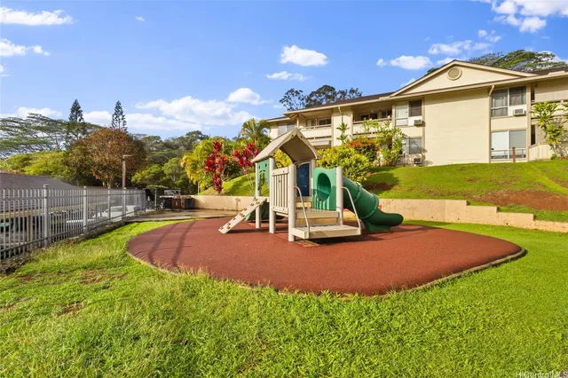a view of a house with swimming pool