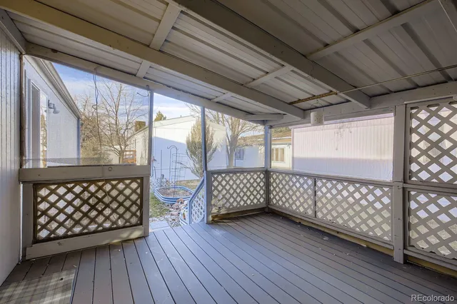 a view of outdoor space with wooden deck