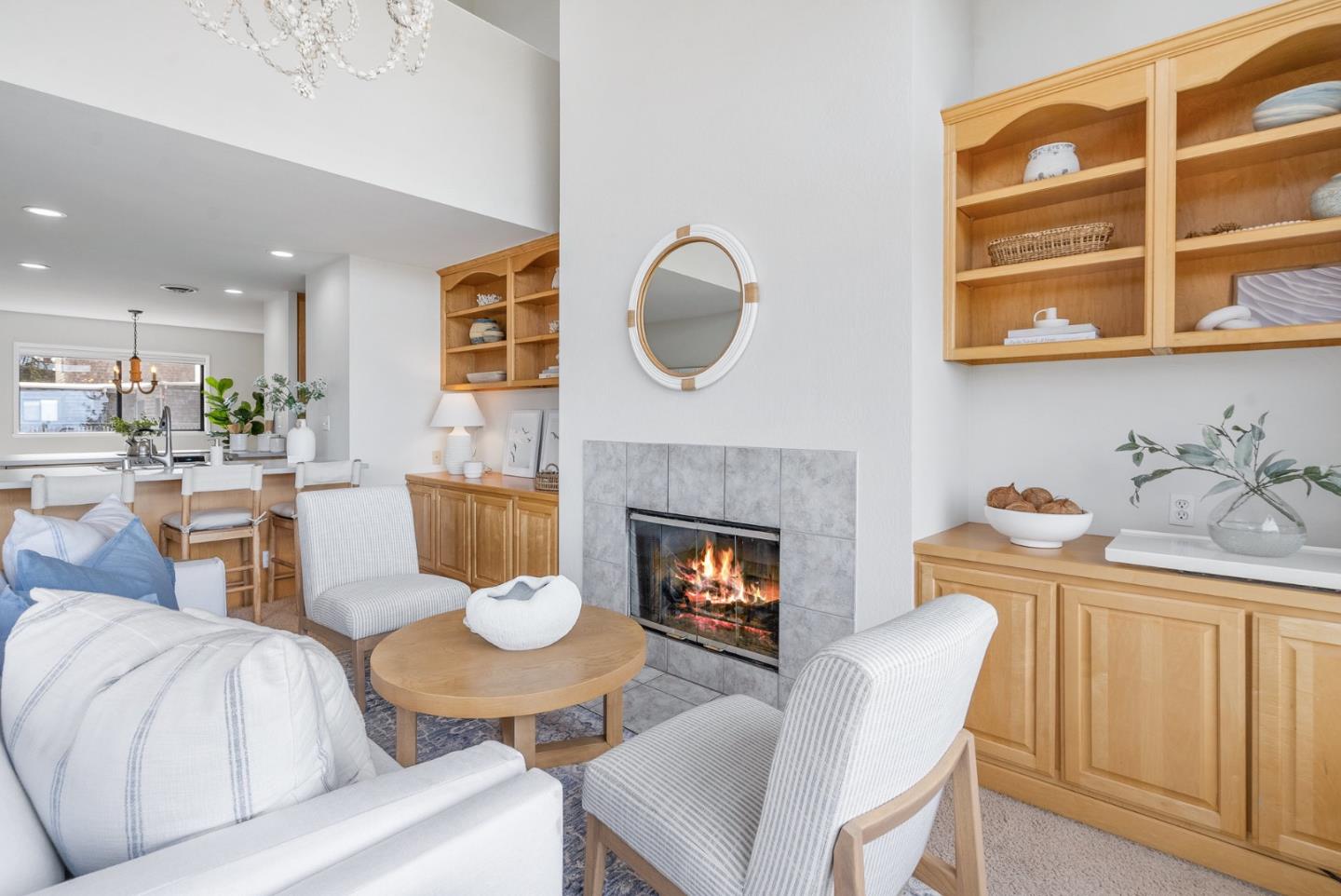 101 Shell Road, Unit 271 Watsonville, CA 95076 - Photo 11 of 43 a living room with furniture a fireplace and kitchen view