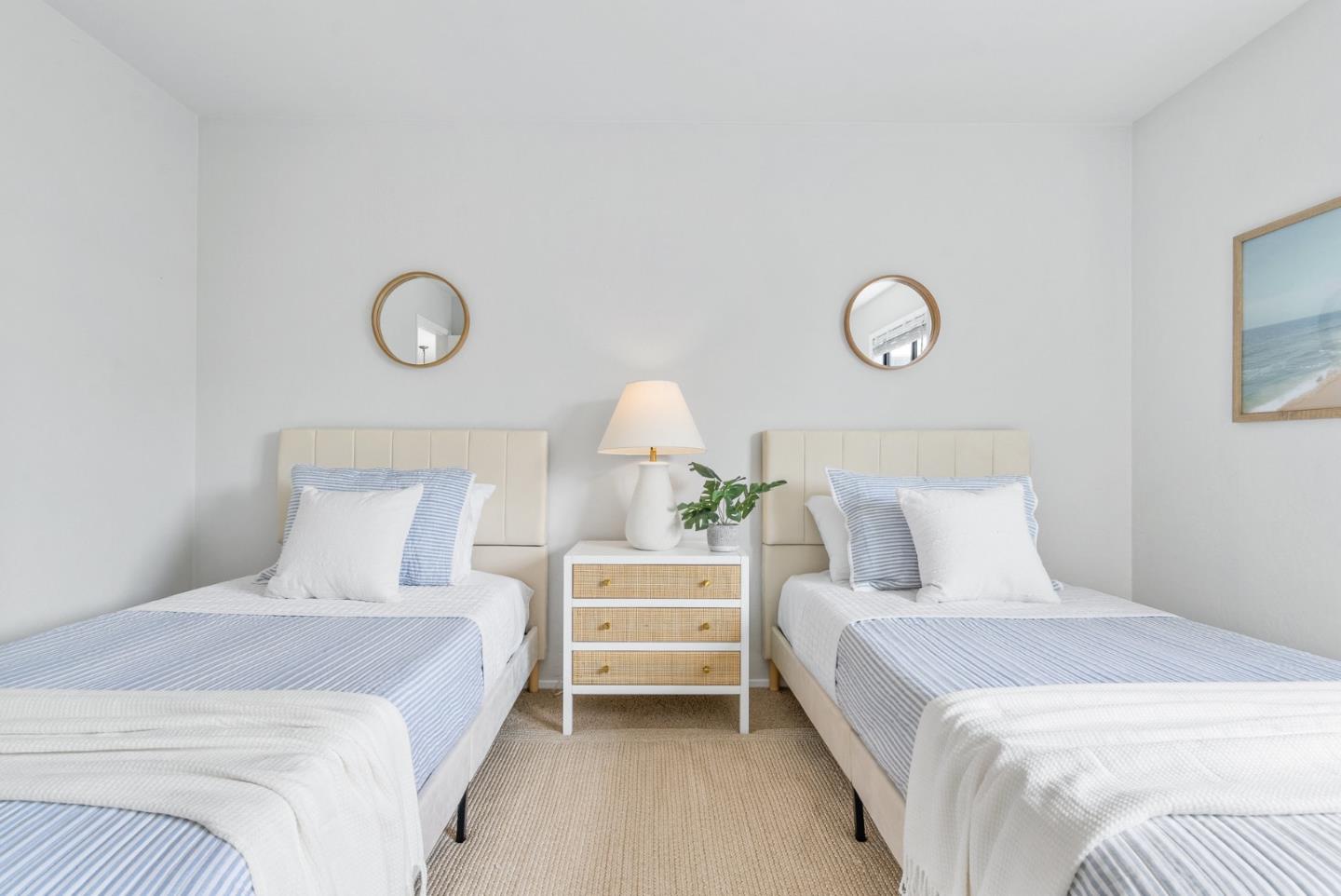 101 Shell Road, Unit 271 Watsonville, CA 95076 - Photo 26 of 43 a bedroom with a bed and a chandelier