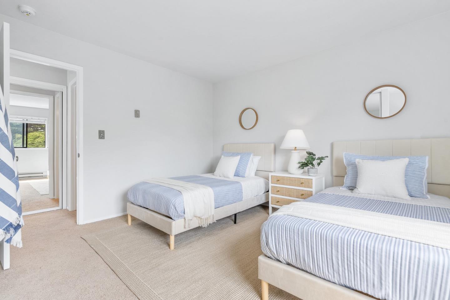 101 Shell Road, Unit 271 Watsonville, CA 95076 - Photo 27 of 43 a bedroom with two beds and painted walls