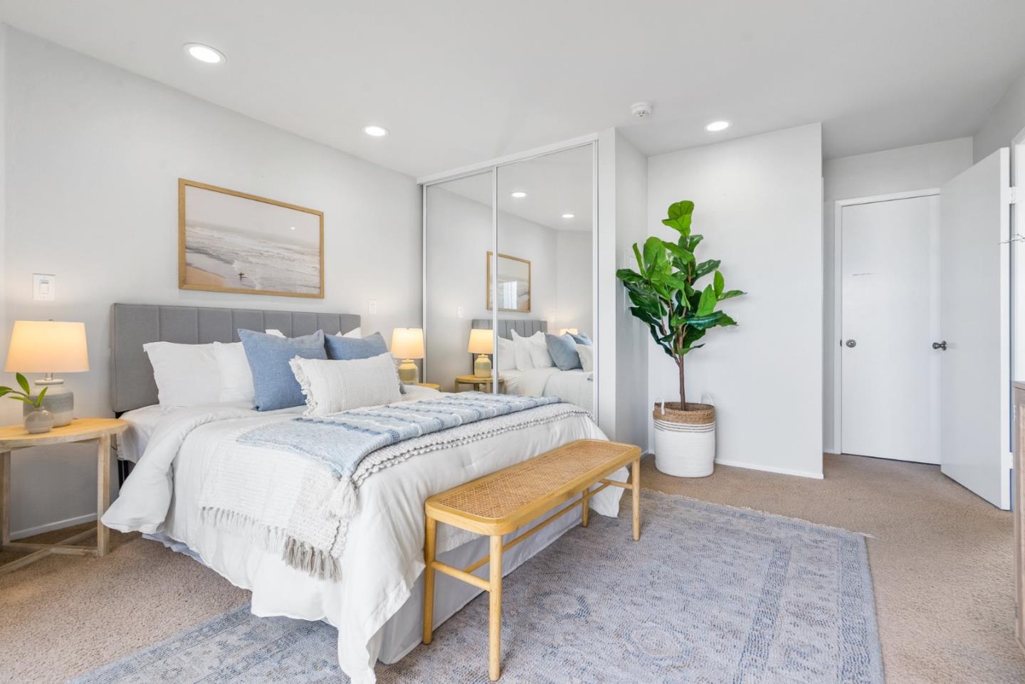 101 Shell Road, Unit 271 Watsonville, CA 95076 - Photo 29 of 43 a spacious bedroom with a bed and a potted plant