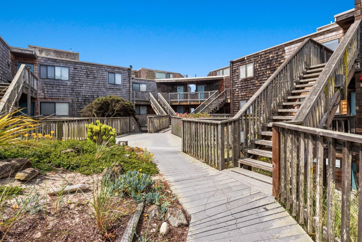 101 Shell Road, Unit 271 Watsonville, CA 95076 - Photo 3 of 43 a view of a house with wooden stairs