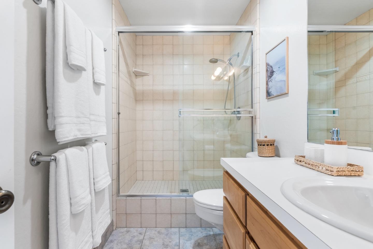 101 Shell Road, Unit 271 Watsonville, CA 95076 - Photo 34 of 43 a bathroom with a sink a toilet and shower