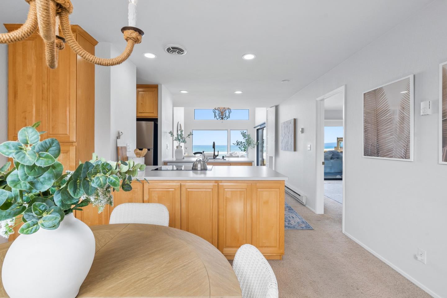 101 Shell Road, Unit 271 Watsonville, CA 95076 - Photo 4 of 43 a view of a kitchen with furniture and a chandelier