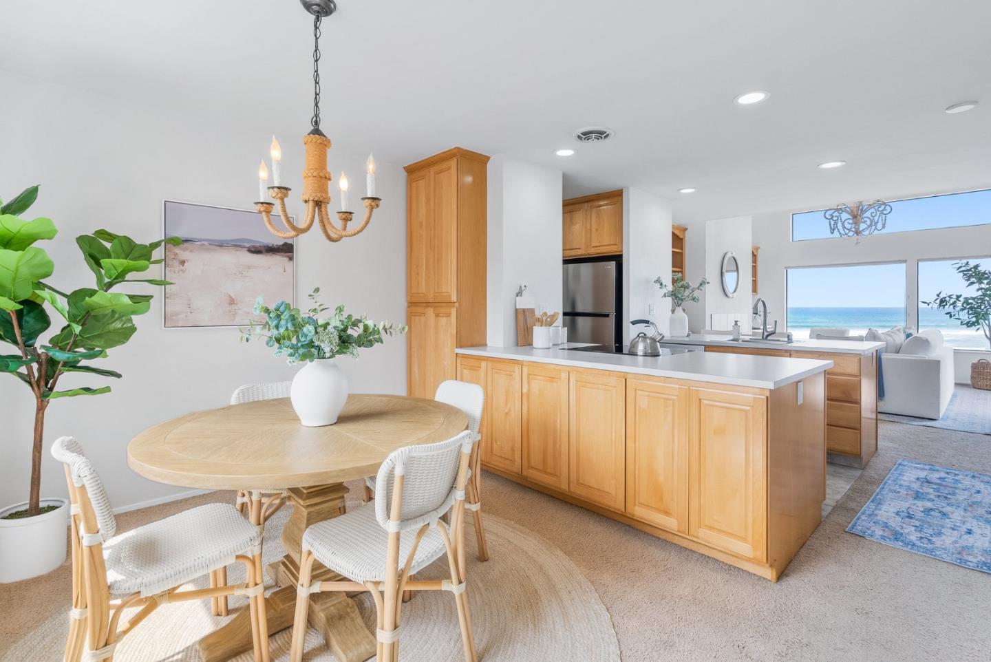 101 Shell Road, Unit 271 Watsonville, CA 95076 - Photo 5 of 43 a dining room filled chandelier and kitchen view